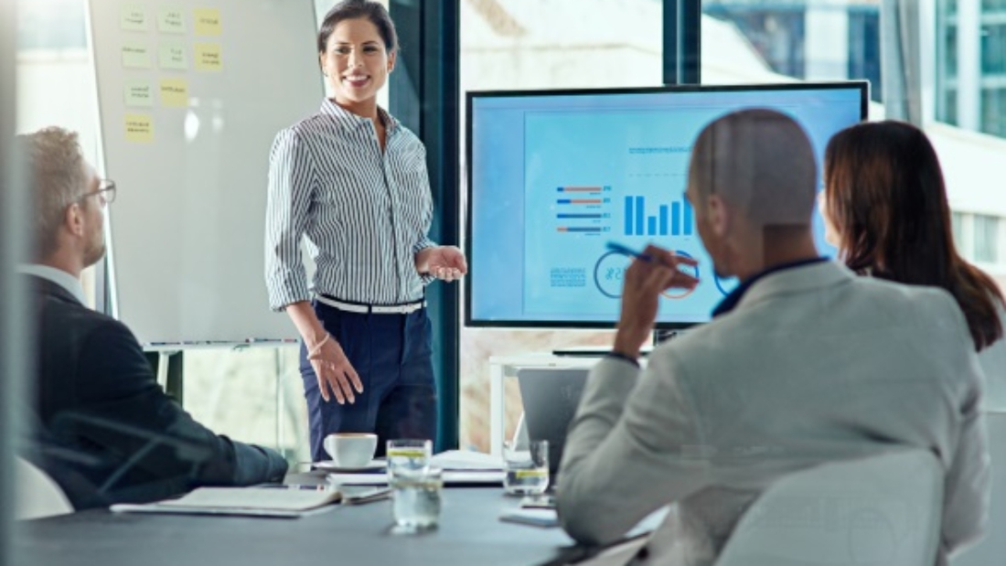 Cropped shot of a businesswoman delivering a presentation in the boardroom